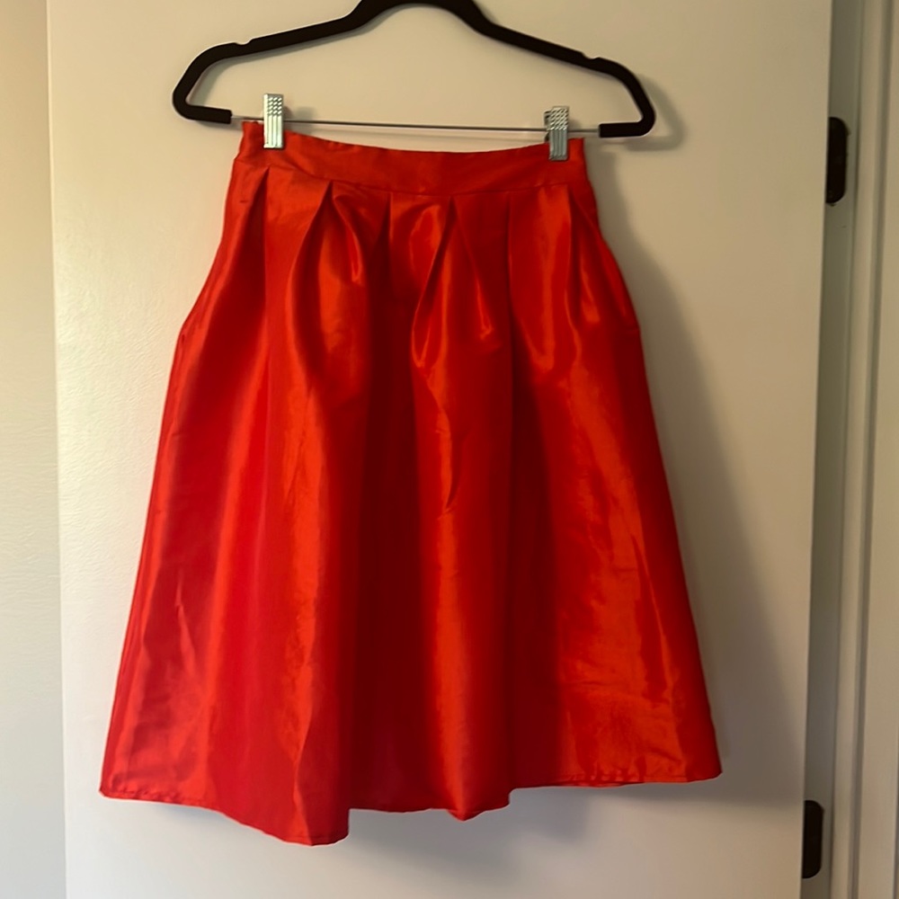 Orange/red midi length fit and flare skirt